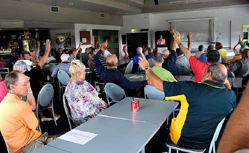 Show of hands: Members of the Gympie Pines Golf club vote against a levy to bail the club out of its financial problems at a special general meeting on Saturday. Show of hands: Members of the Gympie Pines Golf club vote against a levy to bail the club out of its financial problems at a special general meeting on Saturday.